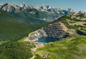 The Canadian Rockies loom over a mountaintop-removal mining site in the Elk Valley of British Columbia, which is adjacent to the Flathead River Valley.